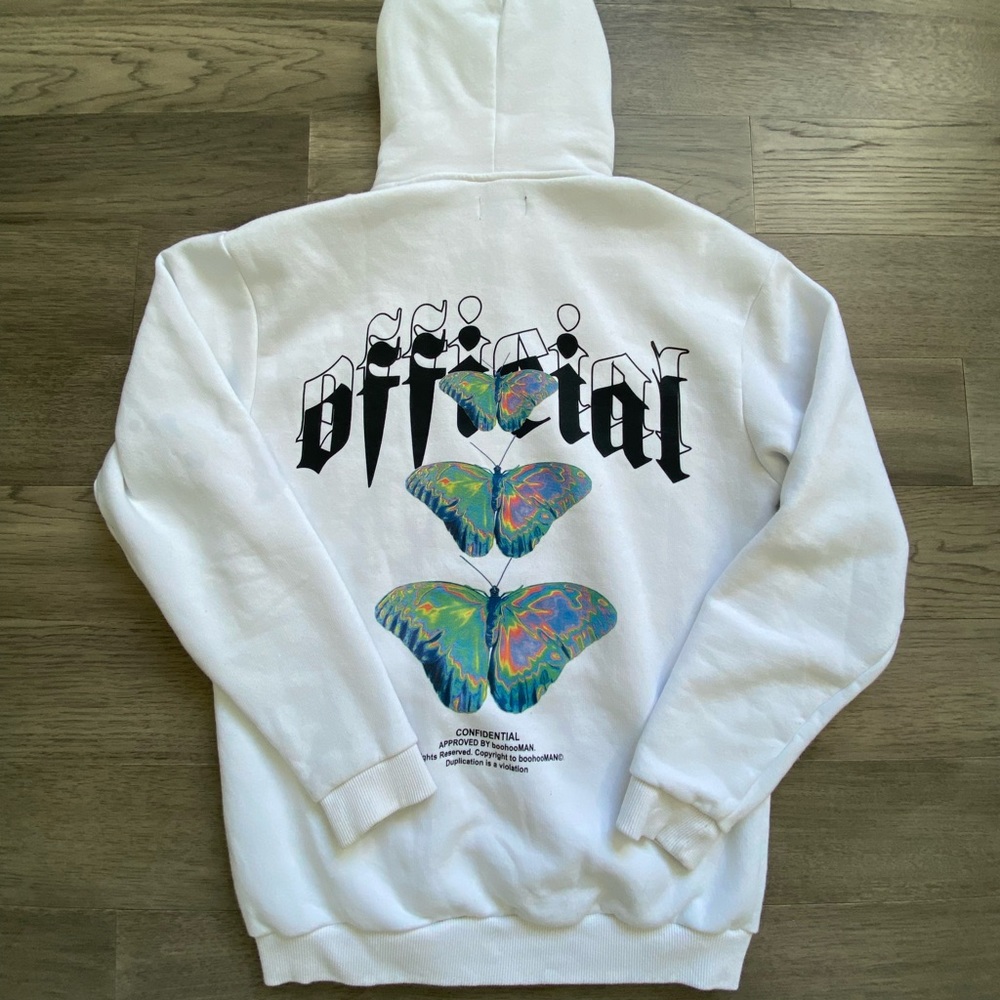 BoohooMAN white butterfly hoodie.